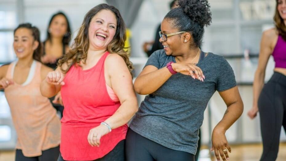 Image of 6 women exercising and laughing