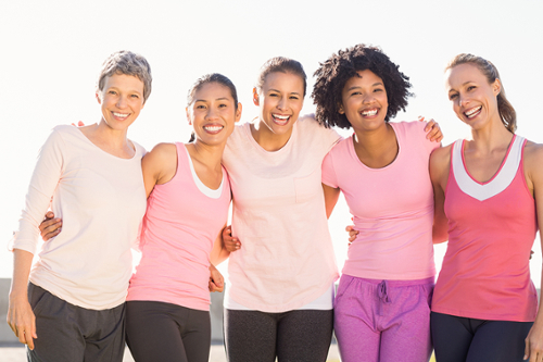 group of women posing and smiling