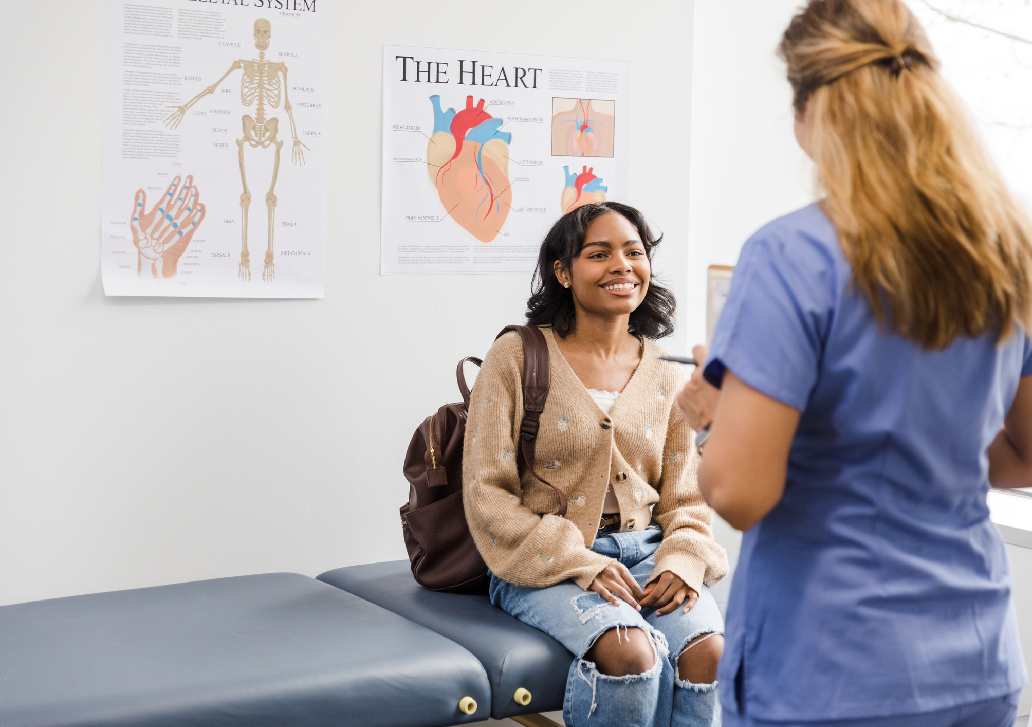 Female student talking with a female doctor
